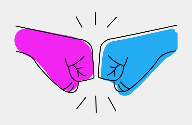 Two fists, performing a fist-bump. Two fists, performing a fist-bump.